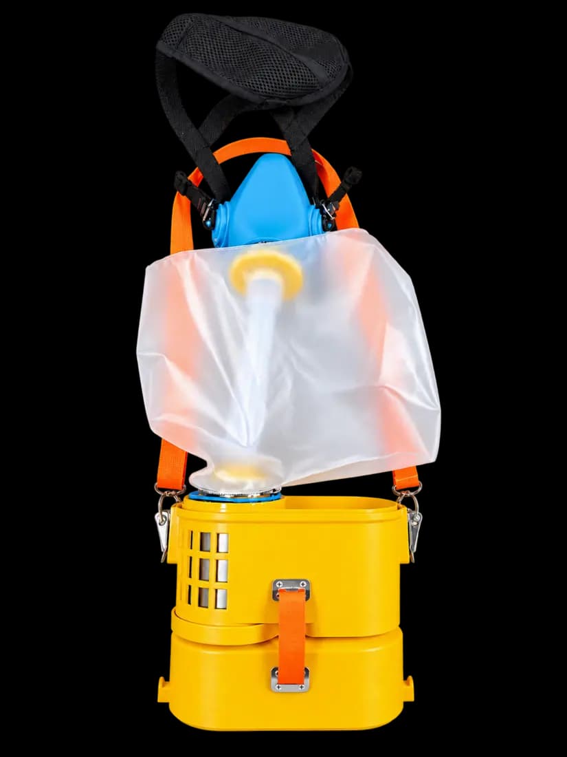 Field O2 breathing unit with blue mask, clear reservoir and yellow cartridge housing