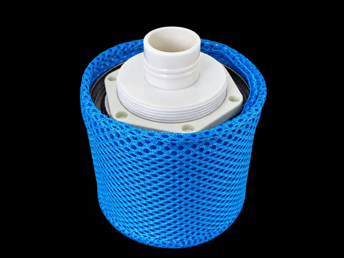 Replacement oxygen cartridge with blue mesh sleeve after opening